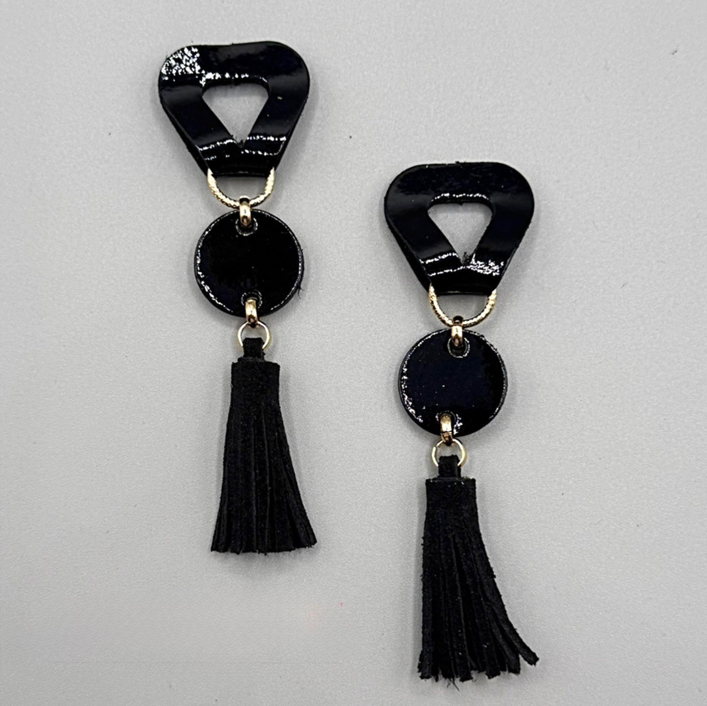 INDUMENTI BLACK LEATHER TASSLE EARRINGS